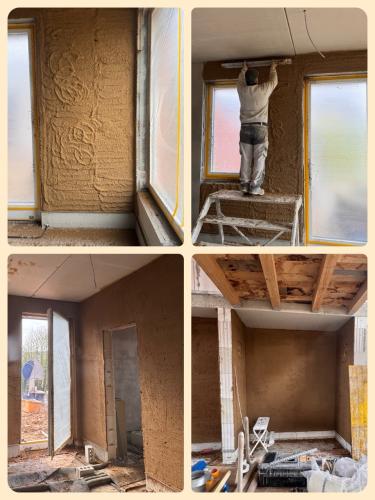 Der Lehmputz wird angebracht