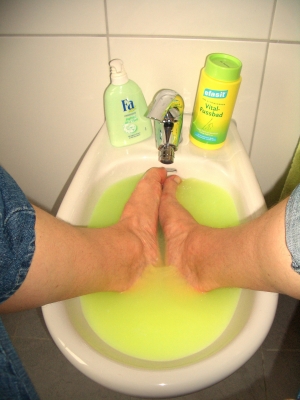 Waschen der Füße
