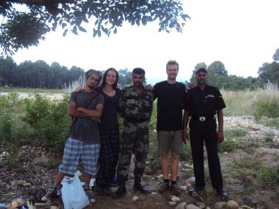 Pastry, Linda, two policemen and me in our river camping