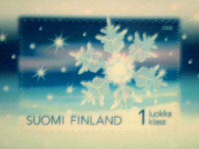 [Bild: finnische Briefmarke mit Schneeflockenmotiv]
